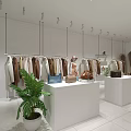 Modern Clothing Store with Hanging Clothes Mannequins Display Counters Bags and Green Plants