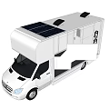 White Recreational Vehicle With Solar Panels On Roof And Open Door