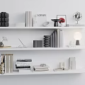 Stylish Bookshelf Display With Decorative Inflatable Models And Accessories 3d model