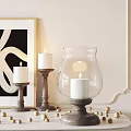 Elegant Glass Candle Lantern With Wooden Base And Golden Decorative Balls On Tabletop