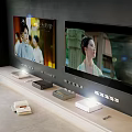 Two Modern TVs Mounted on Wall in Stylish Living Room with TV Stand and Devices