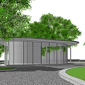 Modern Circular Roof Building Surrounded By Green Trees And Lawn Paths