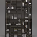 Modern Dark Display Shelf With Multiple Compartments White Bowls Vases And Books