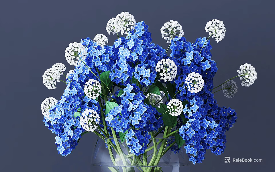 Blue And White Flowers Arranged In Clear Glass Vase With Green Leaves 3d model 