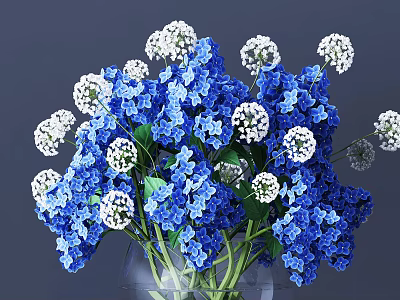 Blue And White Flowers Arranged In Clear Glass Vase With Green Leaves 3d model