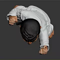 Man in White Karate Uniform Striking Combat Action Pose on Gray Background