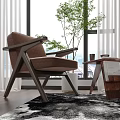 Brown Upholstered Single Sofa With Wooden Frame Side Table And Green Plant Near Window