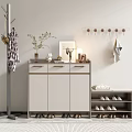 Modern Shoe Cabinet With Drawers Doors Decorative Items And Green Plant By Coat Rack