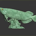 Green Fish Sculpture With Detailed Scales Yellow Eyes And Wave Base Design