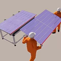 Workers In Orange Workwear And White Helmets Installing Solar Panels