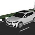 Stylish Silver BMW SUV Exterior Design On Road With Grass Side
