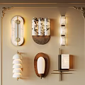 Elegant Modern Wall Lamps With Various Designs Mounted On Beige Wall And Ornate Frame