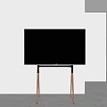 Modern Flat Screen TV on Sleek Stand With Wooden Legs And Minimalist White Interior Space