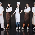 Women Posing Together In Different Styles Of Chef Uniforms And Aprons