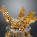 Ornate Golden Decorative Box With Winged Design And Crystal Centerpiece