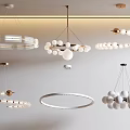 Modern Hanging Chandeliers With Circular Spherical Designs And Metal Frames In White Gold Tones