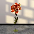 Large Paper Flower Floral Installation With Orange Yellow Petals Green Stem And Shadowy White Wall