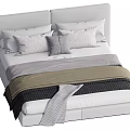 Modern Double Bed With Gray Headboard Decorative Pillows And Layered Blankets