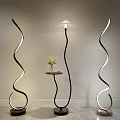 Curved Floor Lamps With White Light Strips And Small Table Indoor