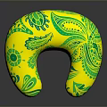 Yellow U Shaped Pillow With Green Leaf Patterns And Soft Surface