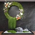 Round Colorful Floral Greenery Wall Decor With Hanging Plants On Dark Background And Silver Decor