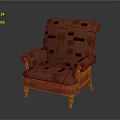 Red Upholstered Armchair With Patterned Fabric And Carved Wooden Legs