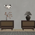 Two Brown Rattan Panel Nightstands With Vase Dried Flowers Table Lamp And Striped Rug