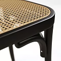 Stylish Public Bench With Black Metal Frame And Woven Seat Design