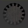 Plant in Dark Gray Cylindrical Metal Planter with Vertical Strips and Round Base