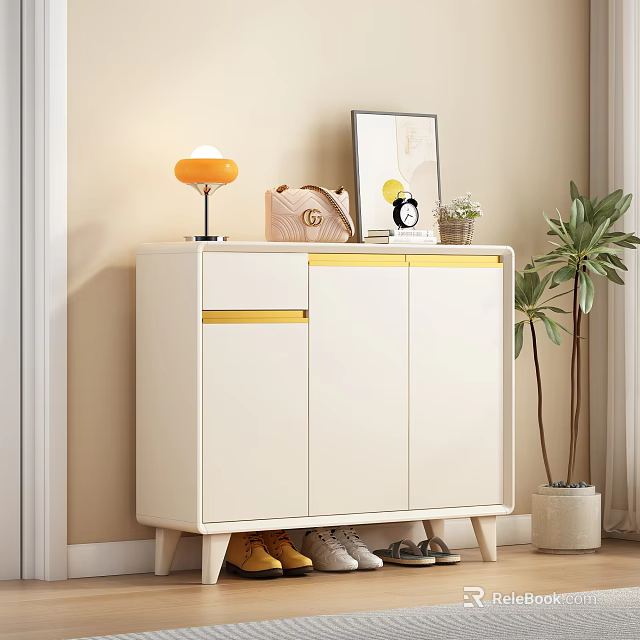Stylish White Shoe Cabinet with Yellow Trim and Decorative Items Near Potted Plant 3d model 