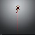 Shiny Golden Weapon with Red Long Handle and Ornate Circular Decorative Head