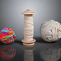 Colorful And White Yarn Balls With Wooden Spool On Black Surface