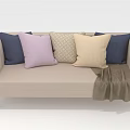 Beige Sectional Sofa with Various Colored Pillows and Brown Blanket for Living Room