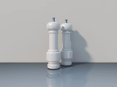 Smart White Pepper Mills With Blue Lids On Gray Countertop Against Light Gray Wall 3d model