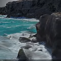 Turquoise Blue Ocean Waves Crashing Against Black Rocks And Coastal Cliffs