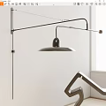Modern Adjustable Metal Arm Wall Lamp With Sleek Design On Neutral Interior Wall