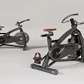Modern Stationary Exercise Bikes With Brown Wooden Seats And Black Metal Frames