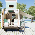 White Van With Green Rooftop Structure And Awning In Outdoor Setting With Trees And Grass
