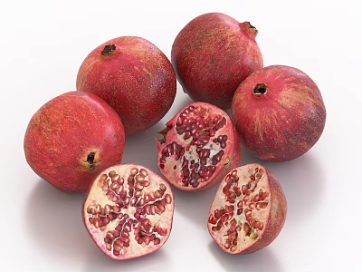 Juicy Ripe Pomegranates Whole and Sliced Displaying Fresh Red Seeds on White Background 3d model