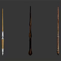 Three Wooden Magic Wands With Carved Designs And Decorative Handles