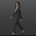 Professional Business Woman in Gray Suit and White Shirt Walking Confidently Against Black Background