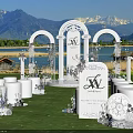 Commercial Equipment For Outdoor Wedding With White Arches Chairs Lake And Mountain Views