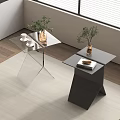 Modern Interior With Glass And Dark Side Tables Decorated With Plants Cups And Books