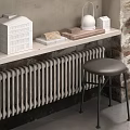 White Radiator In Modern Interior With Brick Wall Wooden Shelf And Stool
