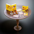 Round Wooden Table Displaying Yellow Boxes Cards CDs And Small Items 3d model