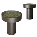 Modern Round Top Coffee Table With Cylindrical Base And Green Plants Inside