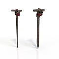 Two Ancient Weapons Made Of Rusted Iron Nails With Red Decorations On Top