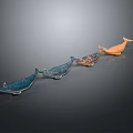 Blue And Orange Aquatic Animal Whale Sculptures On Gray Background