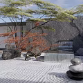 Natural Rockery Stones in Japanese Zen Garden with Circular Patterns Maple Trees and Water Feature