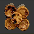 Freshly Baked Portuguese Egg Tarts With Golden Brown Crust And Caramelized Top